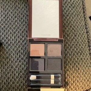 Tom Ford eye shadow quad.  45 iconic smoke. Used 1-2 times